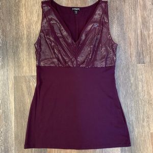 Express wine colored V-neck sequined top.